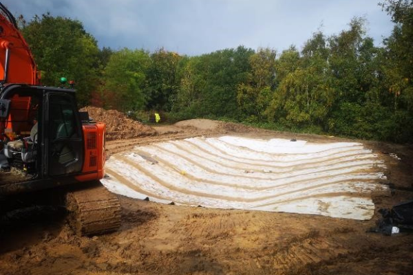 Brookhill Pond site restoration project. Buckley. Waterproof membrane laid.